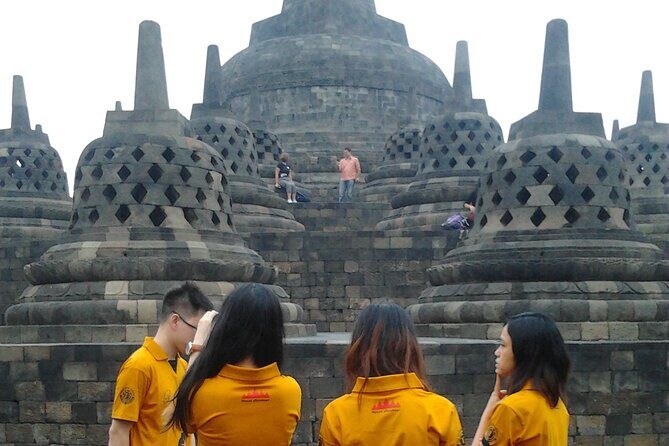 Borobudur Sunrise on the Top of Stupa Borobudur Temple - Prambanan Temples at the End: Shiva, Concentric Squares, and Big Towers