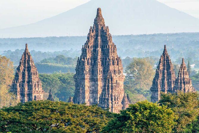 Yogyakarta: Borobudur Climb-up & Prambanan Day Trip All Inclusive - Borobudur climb-up: 504 Buddha statues and the bell-shaped spires